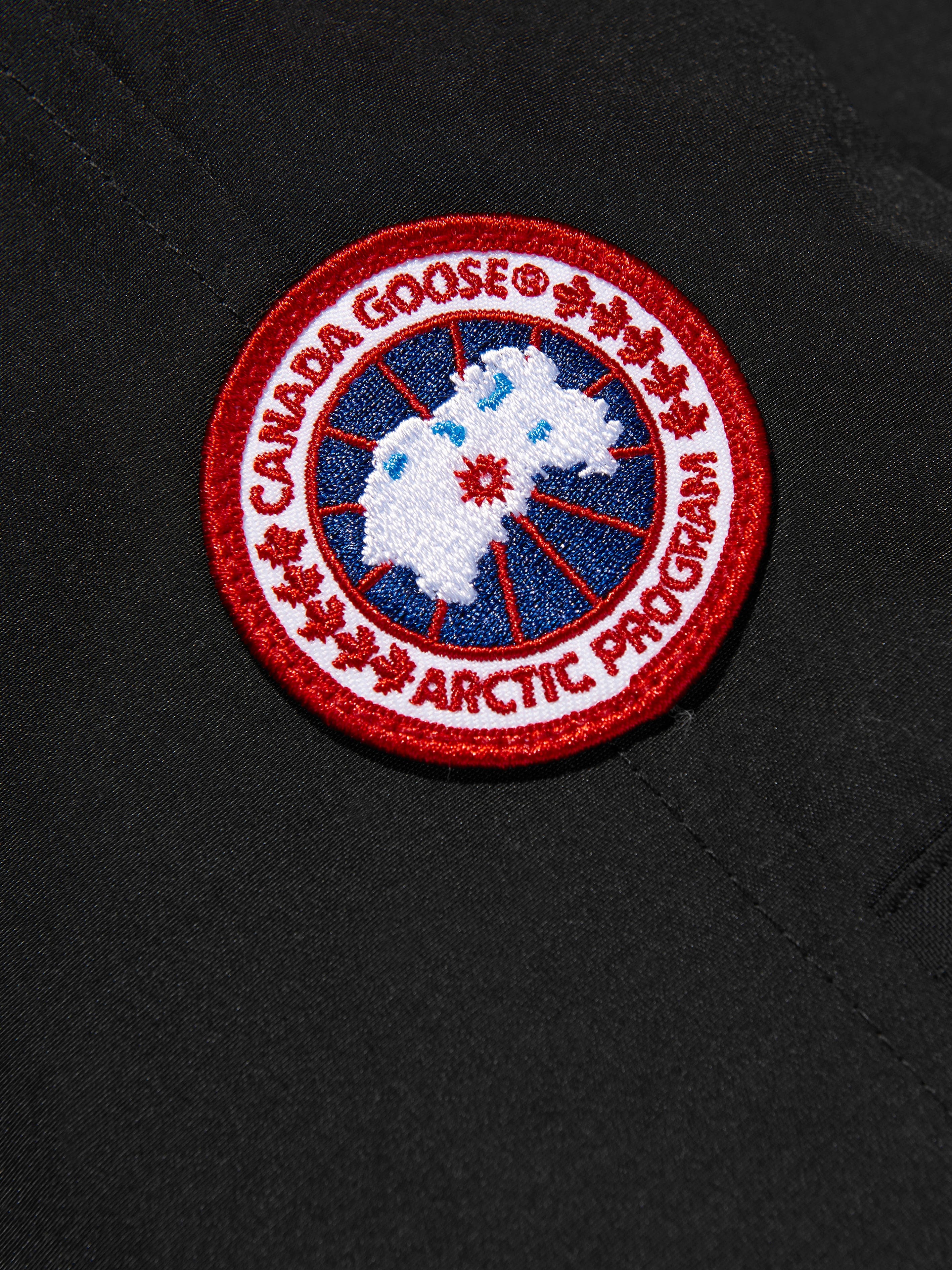 Canada Goose Kids Chilliwack Bomber in Black Looking For