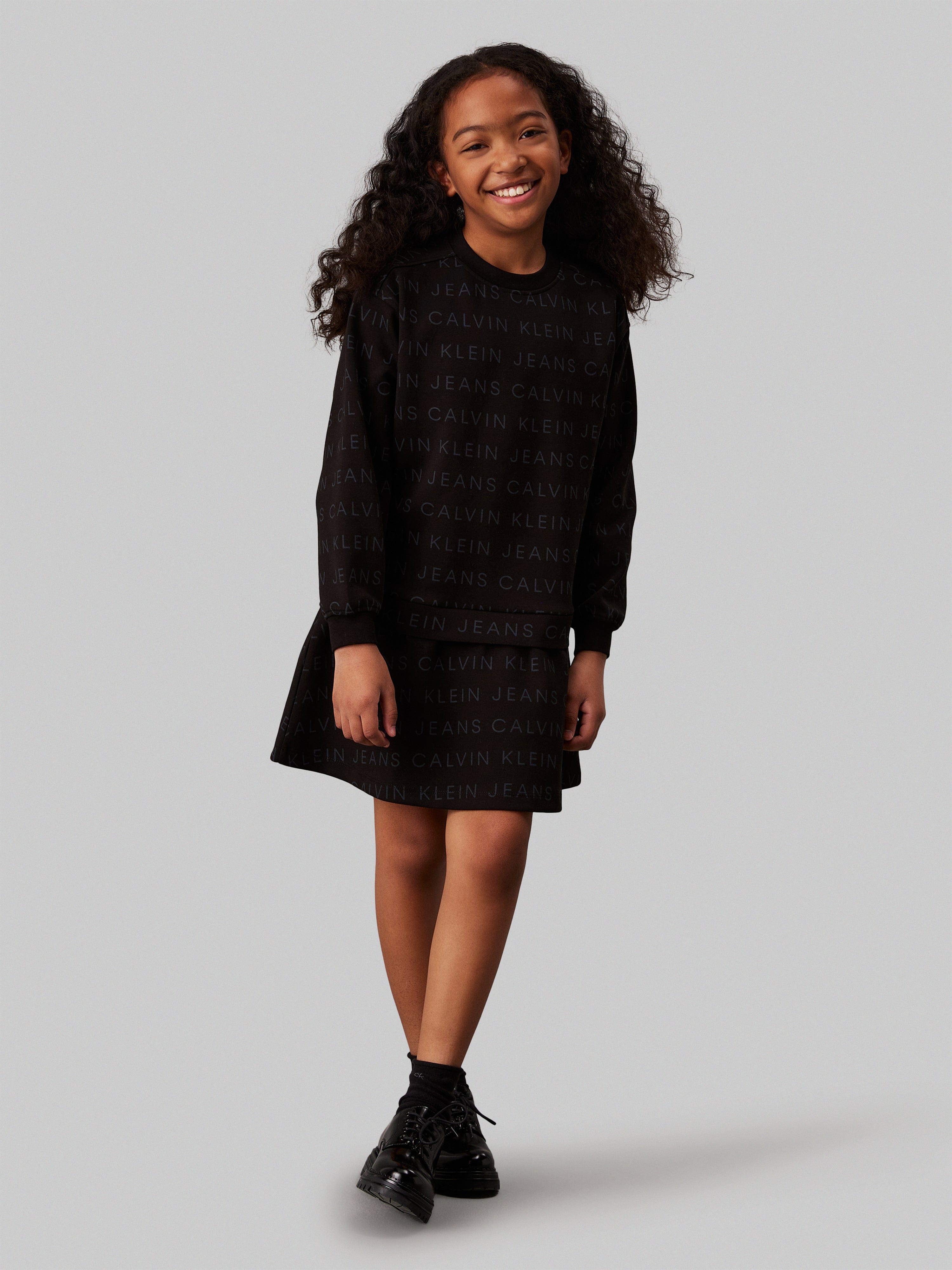 Calvin Klein Girls Logo AOP Fleece Dress in Black Affordable Cheap Pice
